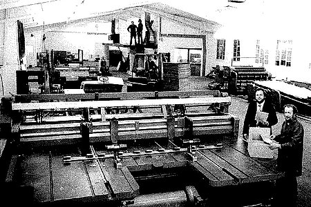 a man standing in a factory